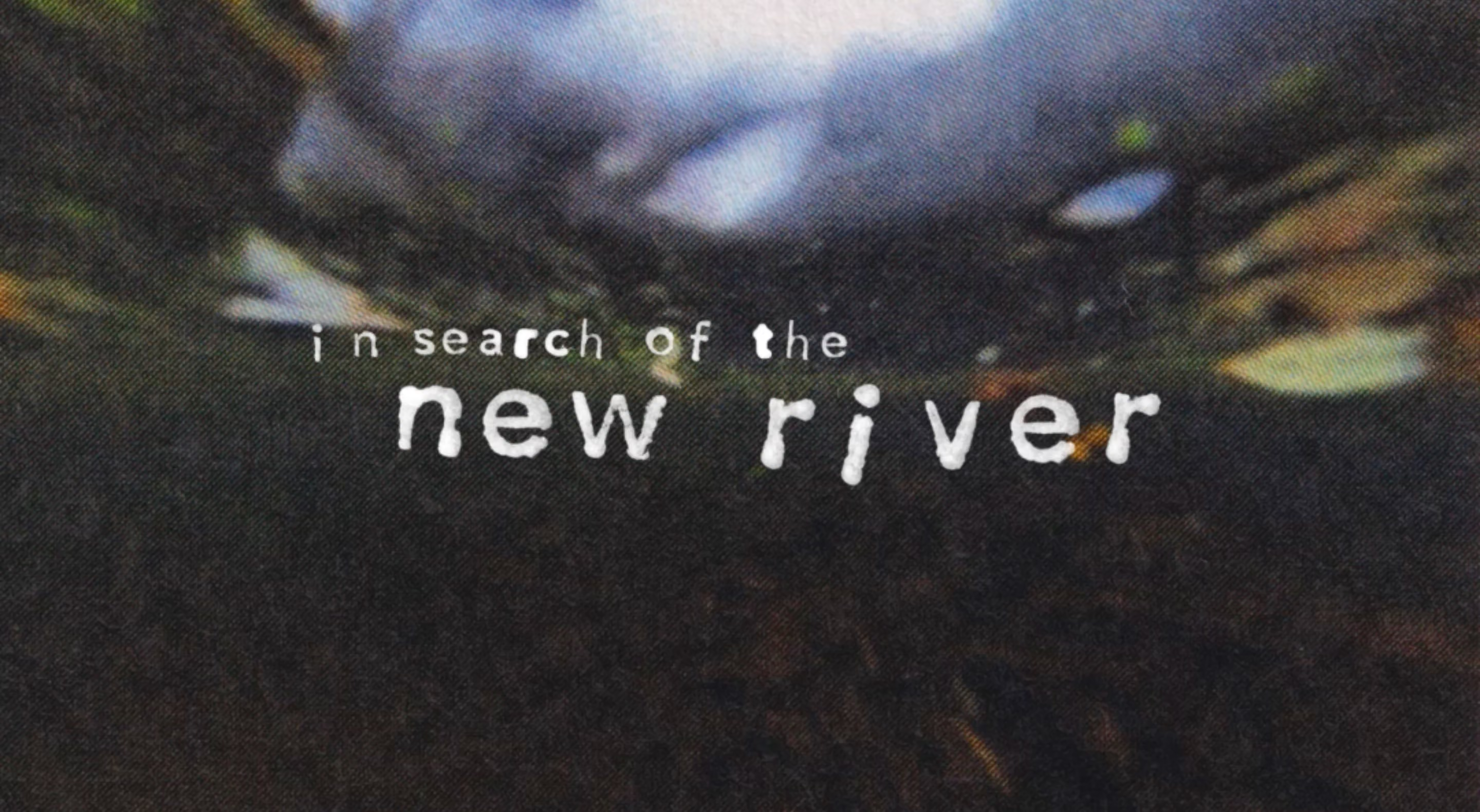 An underwater scene with the stamped text "in search of the new river" over it.