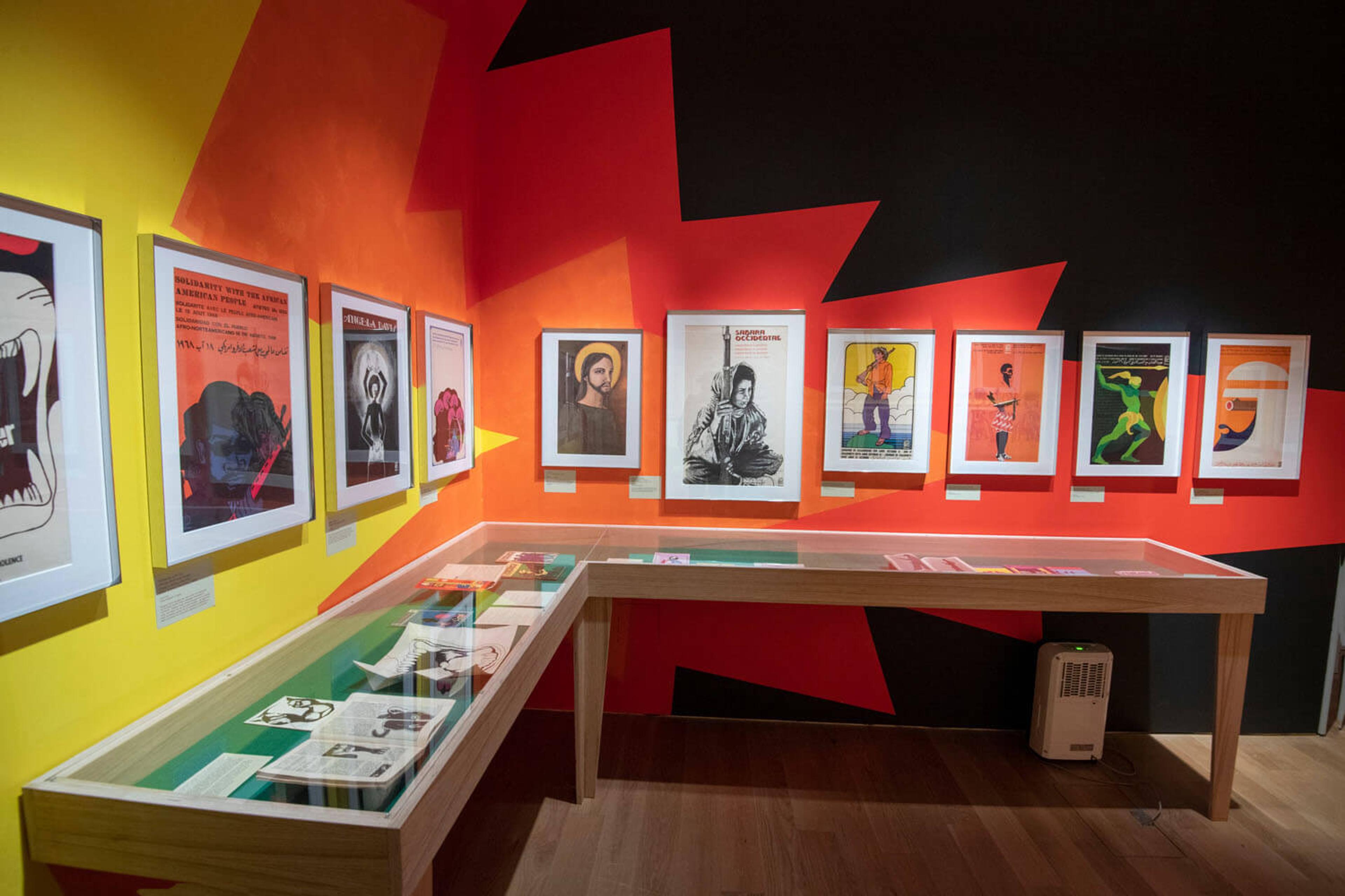 Display cases and framed posters at the exhibition