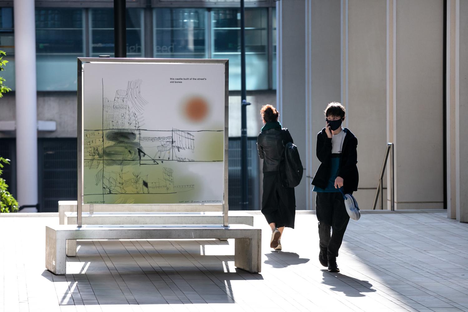 Peony Gent's comic on display in a public hoarding