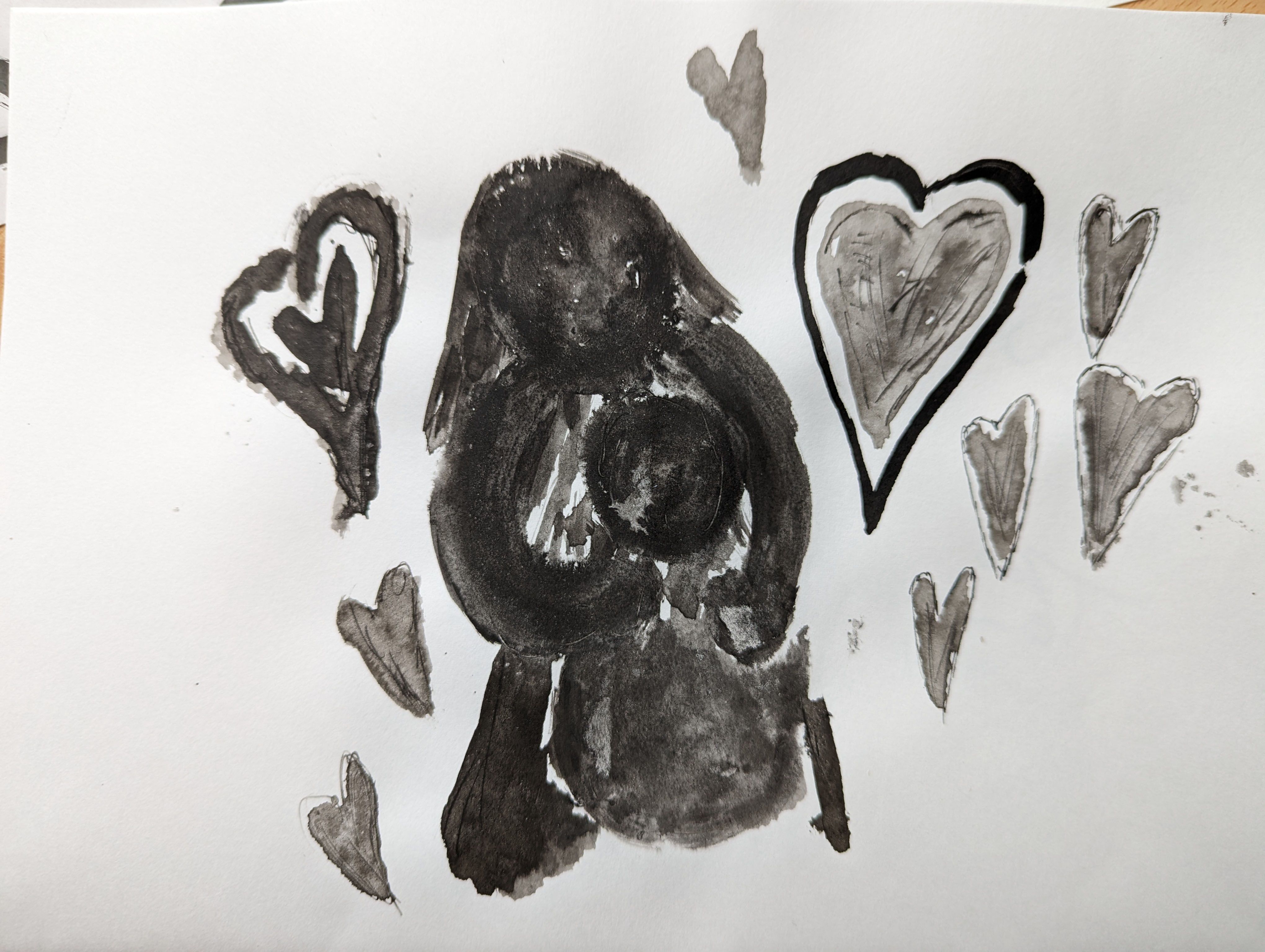 Illustration of a person with a child in their arms surrounded by hearts