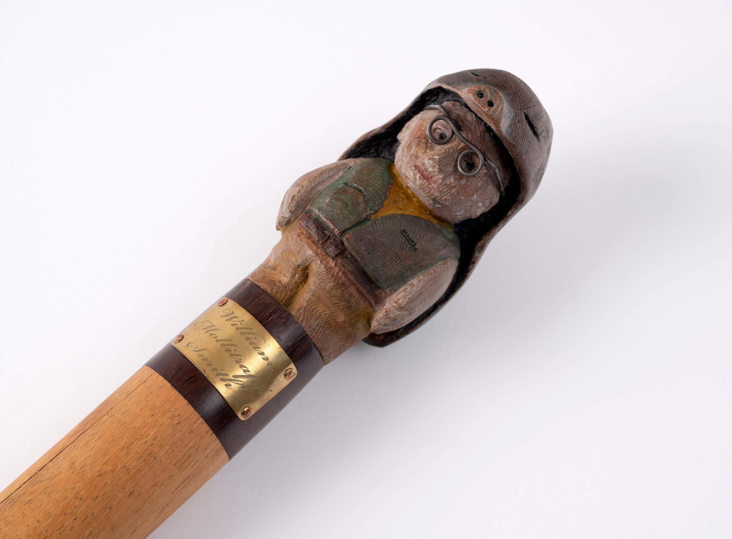 Carved wooden man wearing a mole costume