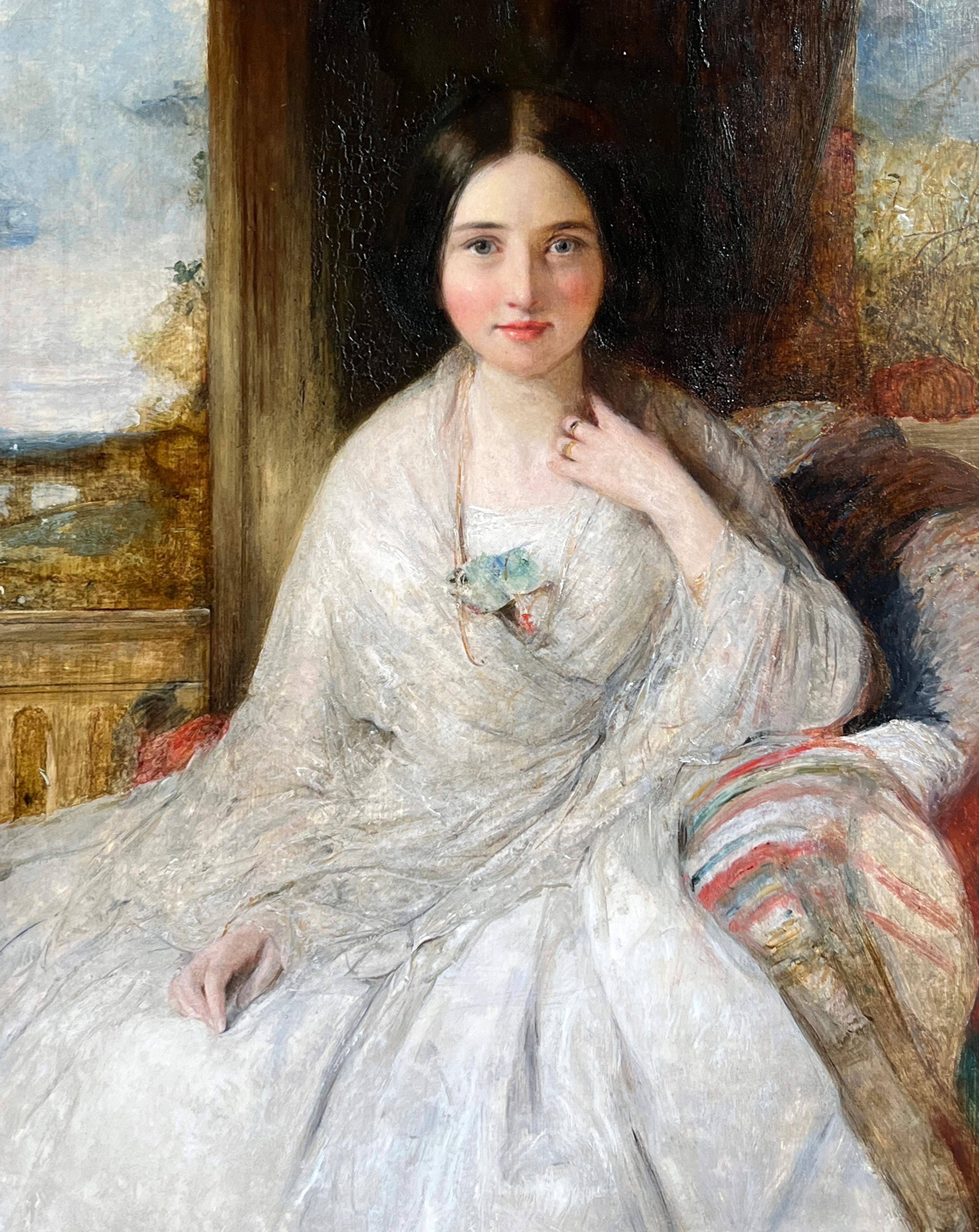 Painting of a woman with dark hair, wearing a white dress, sitting in front of a window.