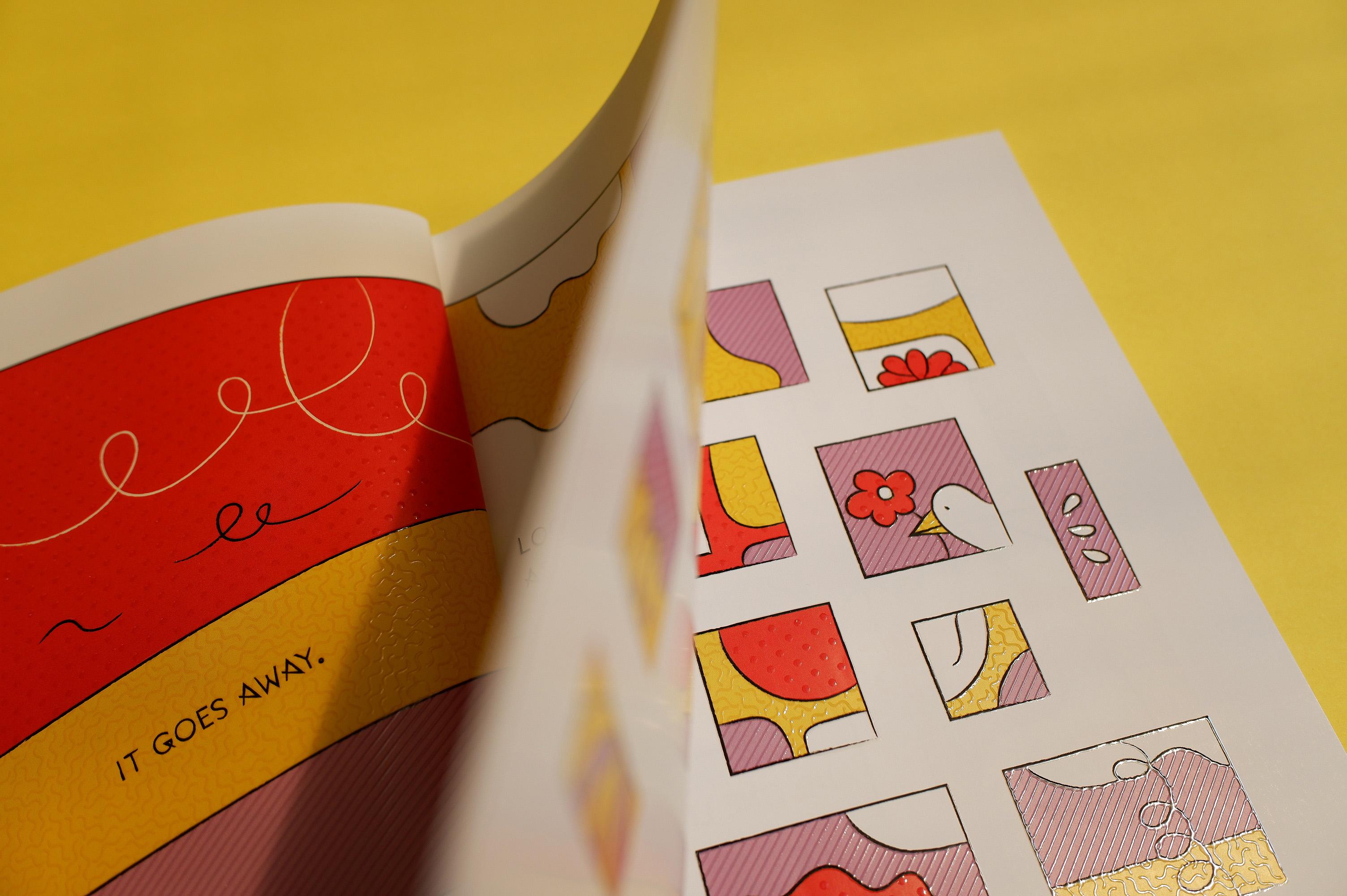 A photo of the opening of a colourful illustrated comic, with the text 'It goes away.'.