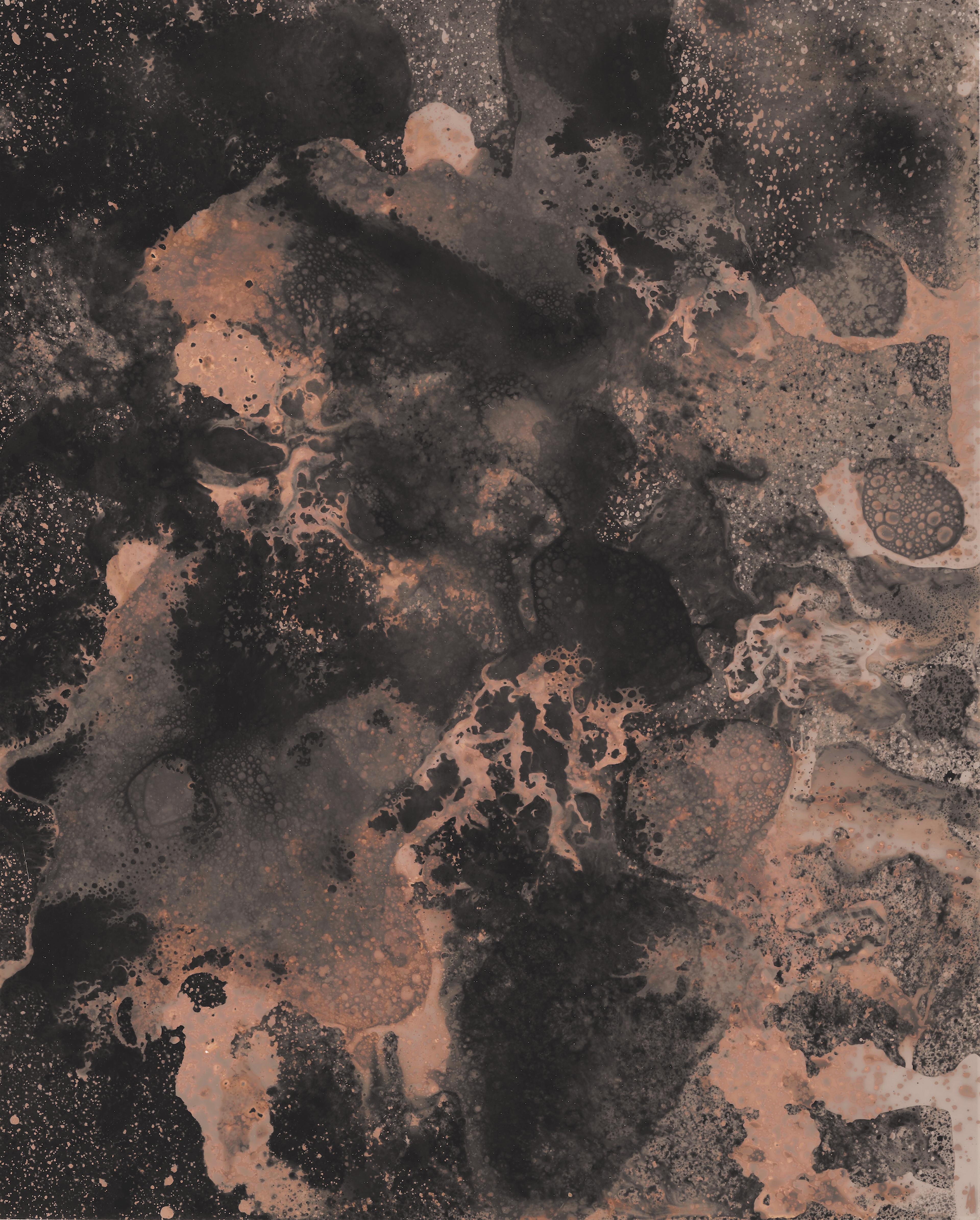 Abstract print with dark and light contrasting elements made by bubbling liquids and drips