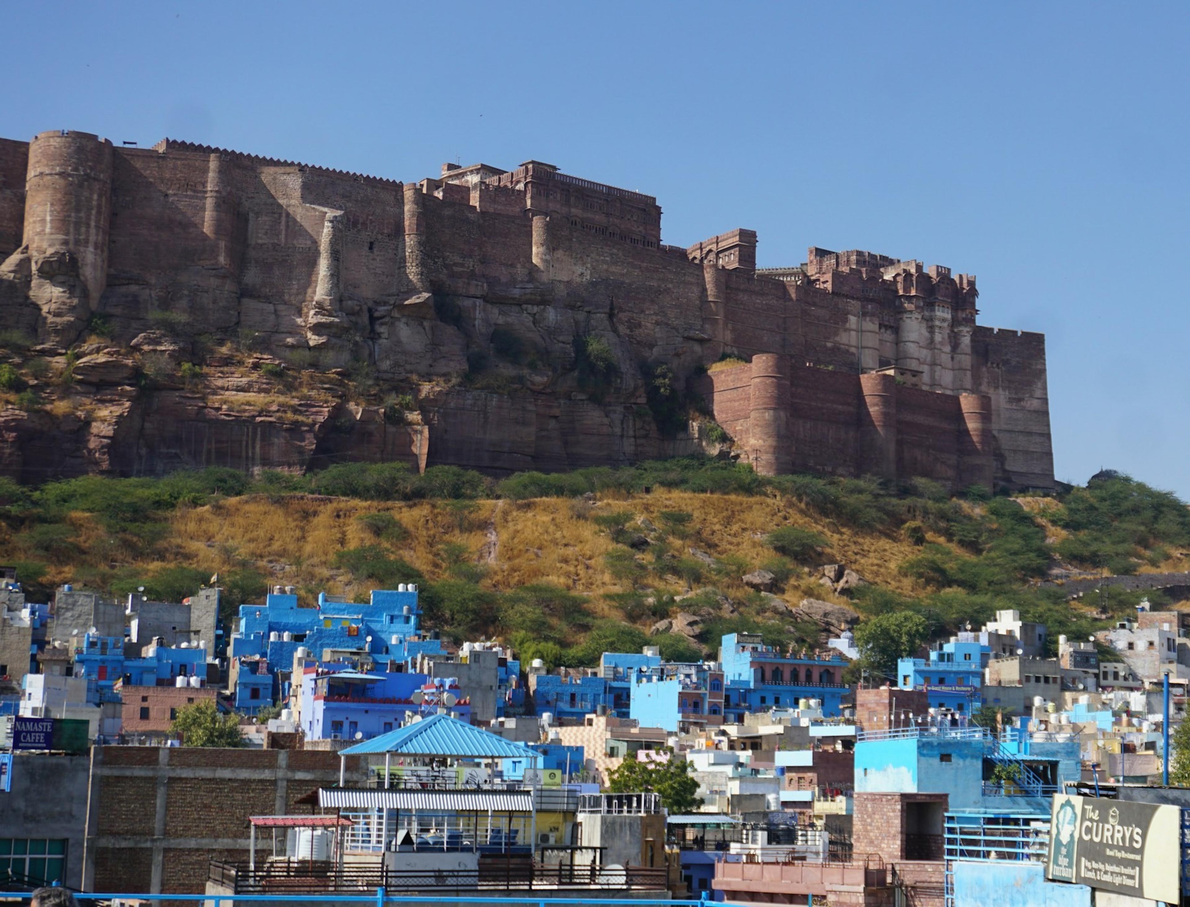 Mehrangarh Fort on its cliff above the blue houses of Jodhpur