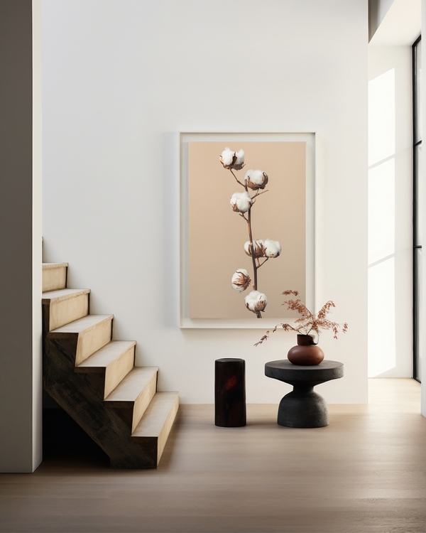 A poste of a Cotton branches arranged vertically on warm neutral background