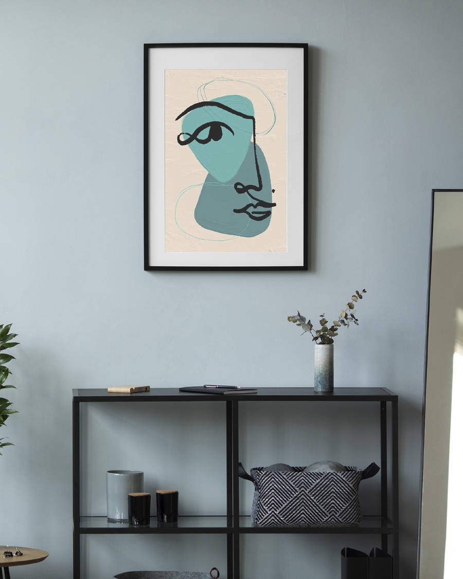 A poster of a Abstract teal face with black line on beige background