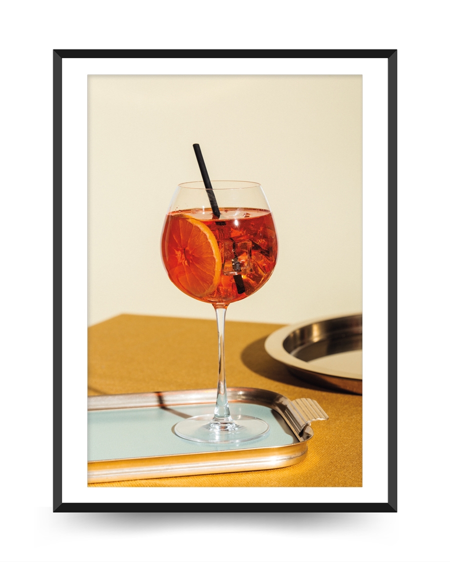 A poster of a Orange cocktail in wine glass on tray