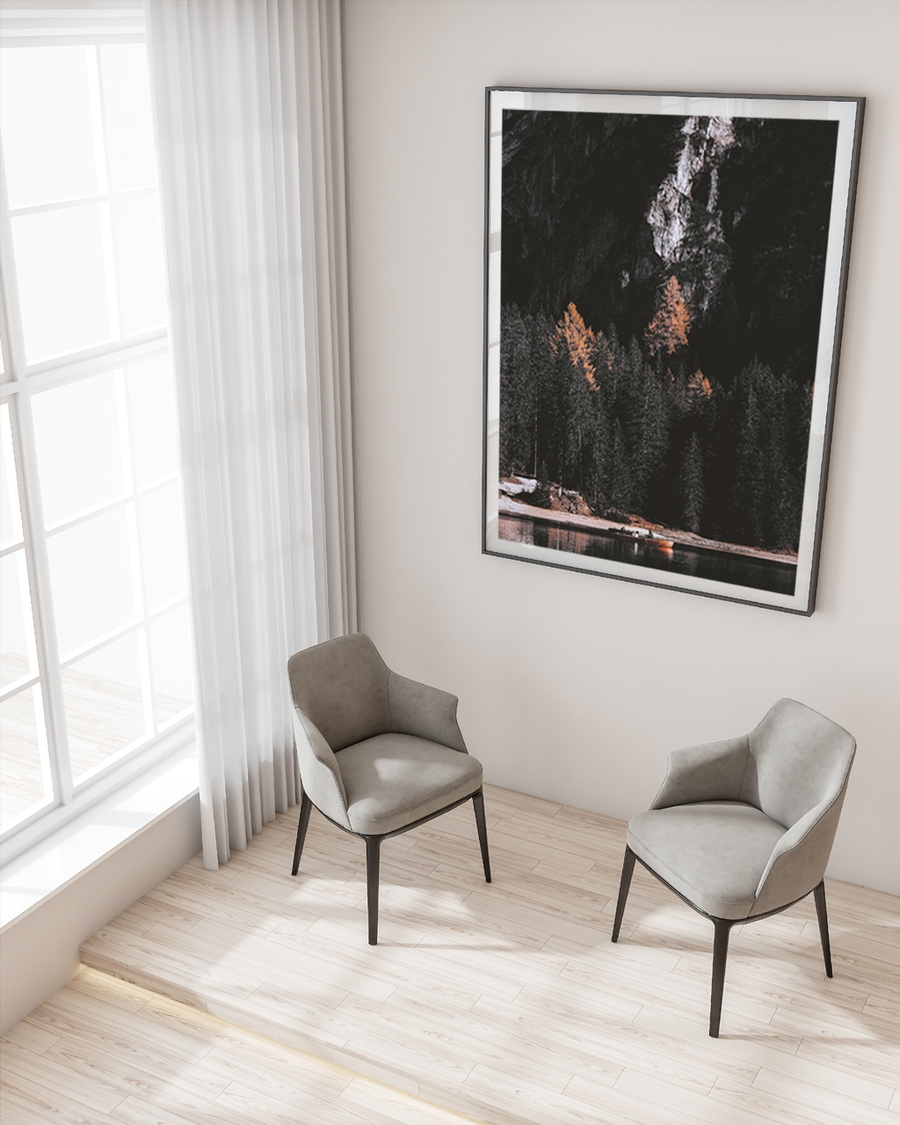 A poster of a autumn trees and forest by rocky mountain cliffs