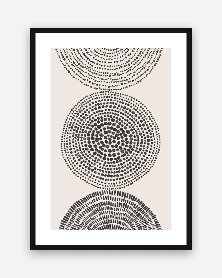 Stippled Circles poster with a white border in a black frame