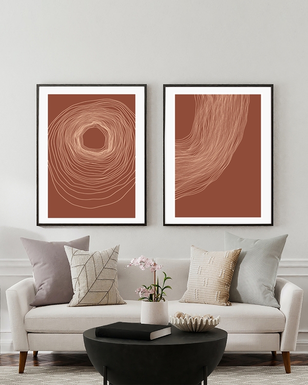 A poster of a three terracotta posters with abstract organic line designs
