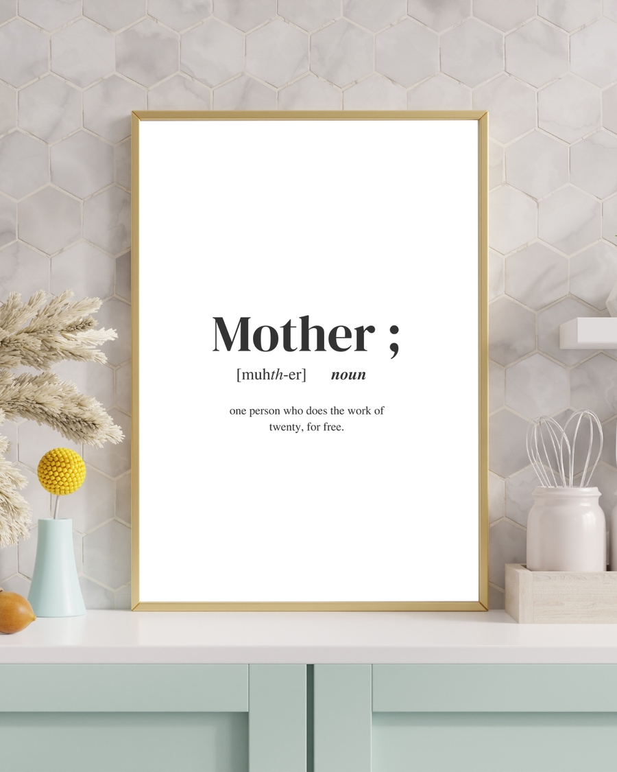 A poster of the definition of the word Mother placed on a light blue table