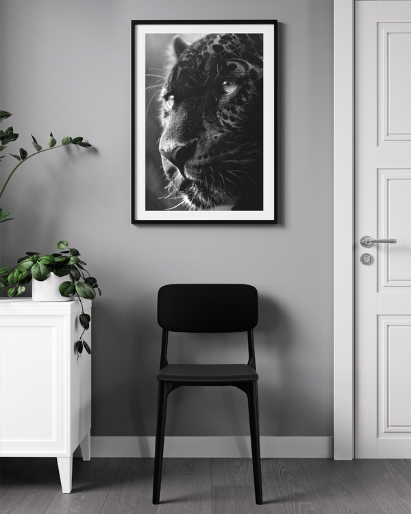 A poster of a Black and white leopard close up portrait