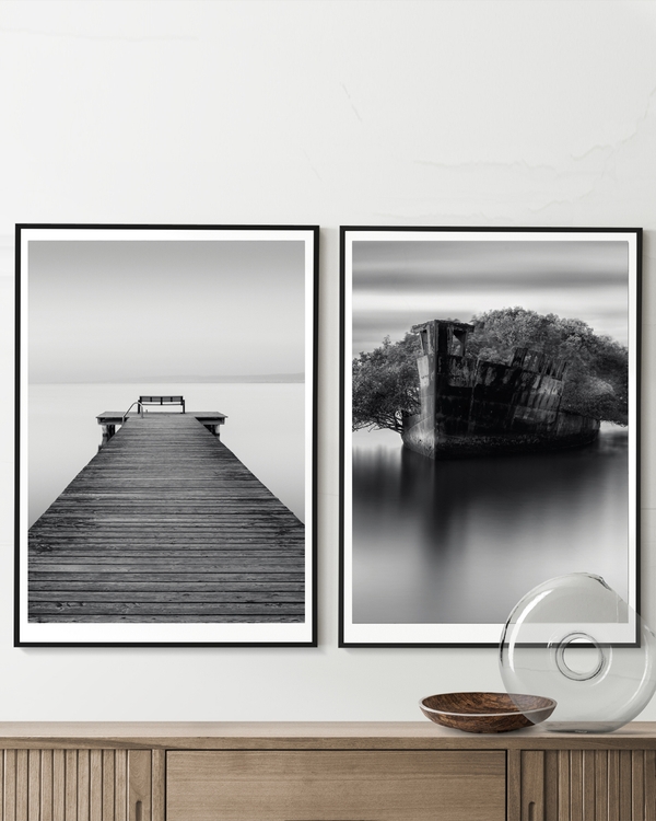 A poster of a Wooden pier leading into calm water and horizon