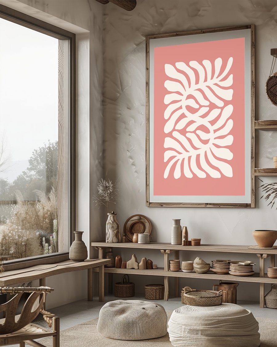 A poster of a Cream leaf-like shapes on coral pink background