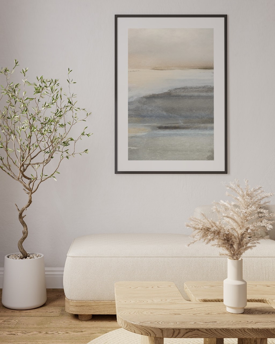 Mist Over Sand poster in a slim black frame above a cream bench in a calm living room