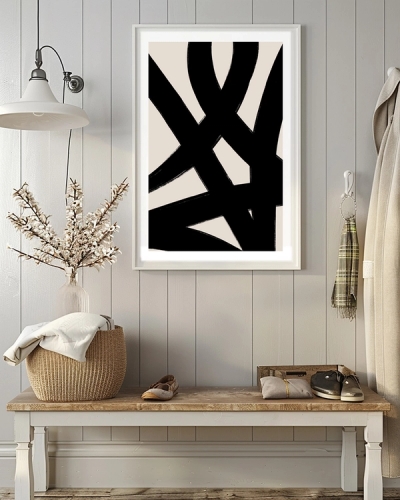 A poster of a thick black intersecting strokes on beige background