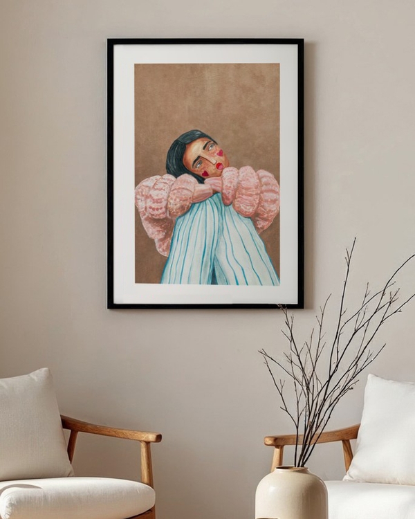 Puff Sleeve Daydream poster in a slim black frame above two wooden armchairs in a neutral living room