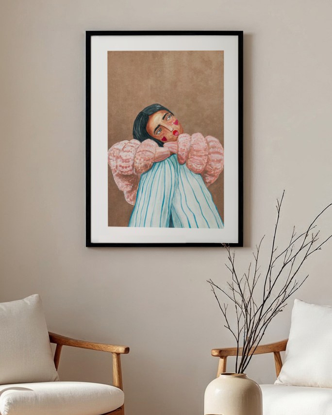 Puff Sleeve Daydream poster in a slim black frame above two wooden armchairs in a neutral living room