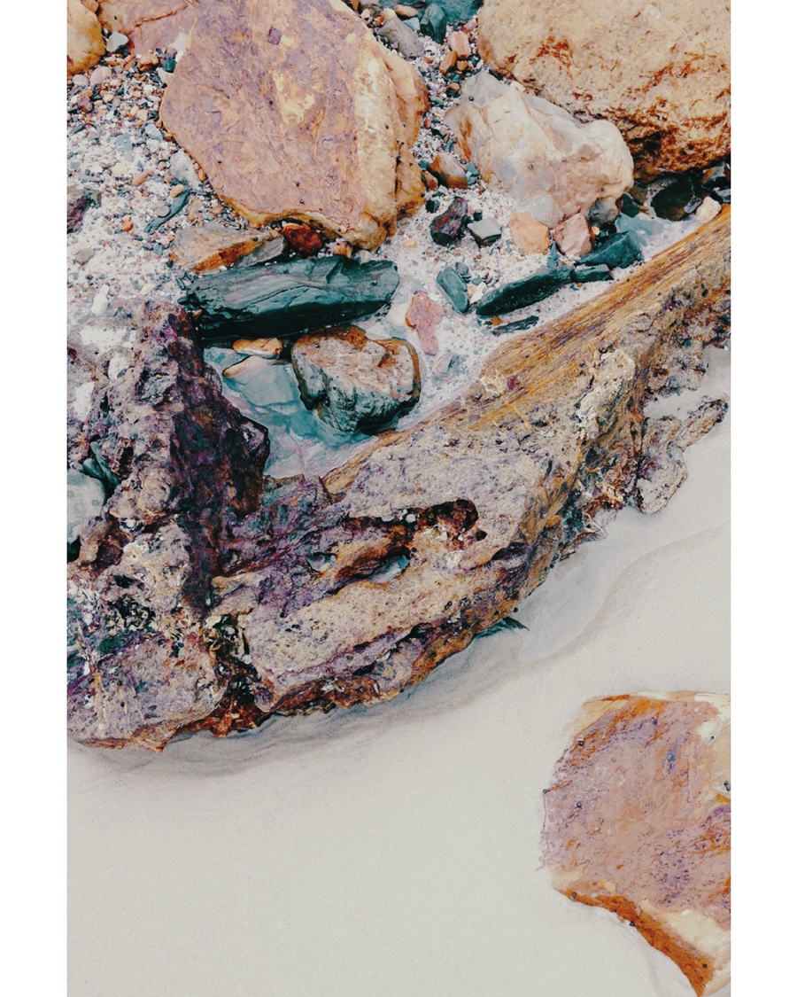 Layered stones and sand textures in earthy muted tones