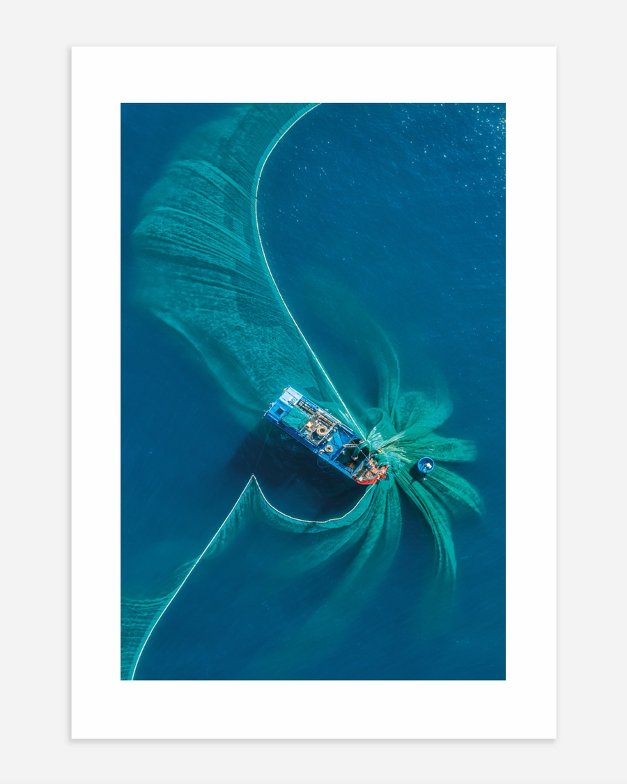 A poster of a Aerial boat creating swirling patterns in blue water