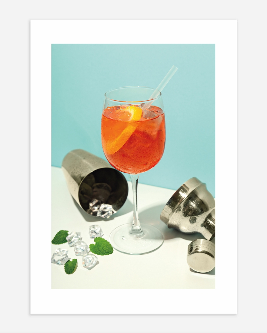 A poster of a Orange cocktail with ice cubes and citrus peel