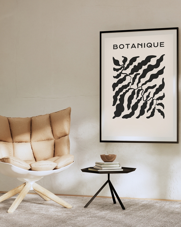 A poster of a Black botanical leaves on warm beige background