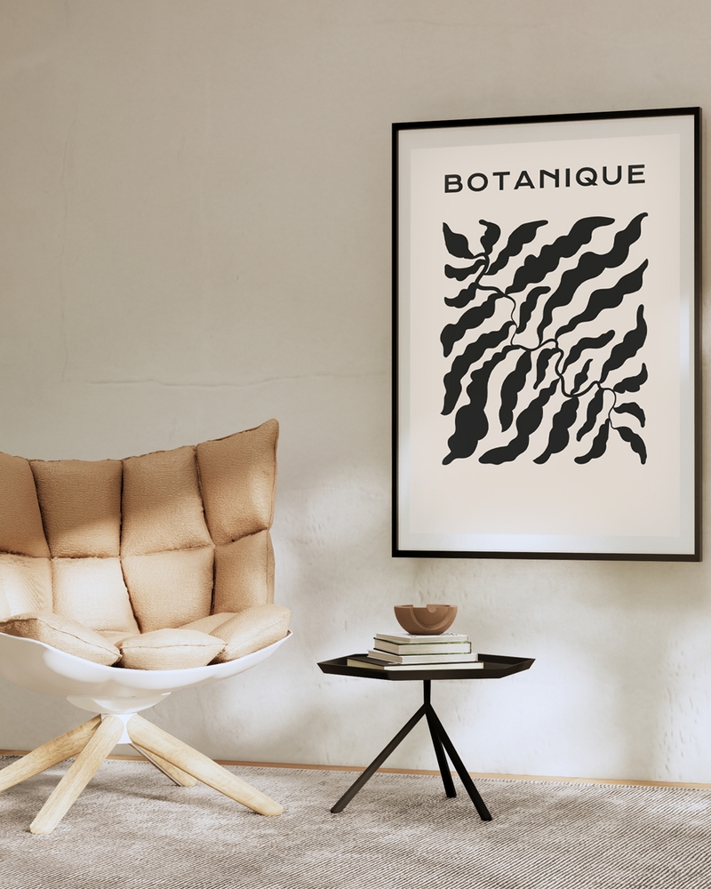 A poster of a Black botanical leaves on warm beige background