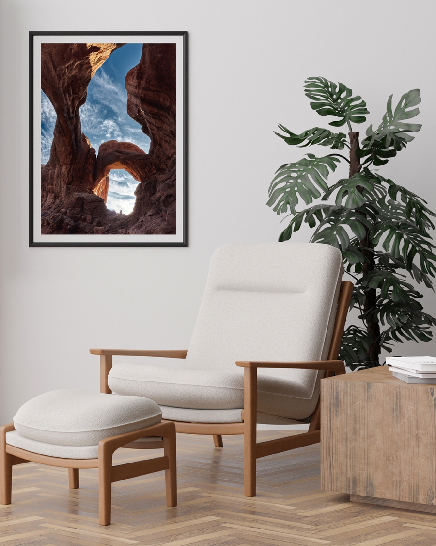 Towering red rock arches with blue sky background