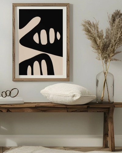 A poster of a beige organic shapes on black abstract background