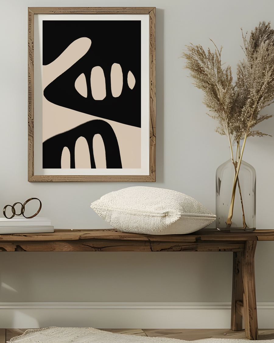 A poster of a beige organic shapes on black abstract background