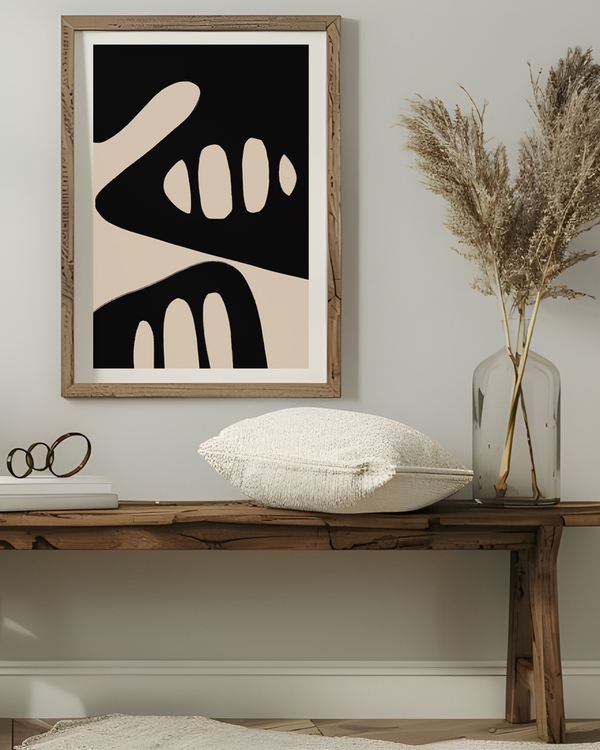 A poster of a beige organic shapes on black abstract background