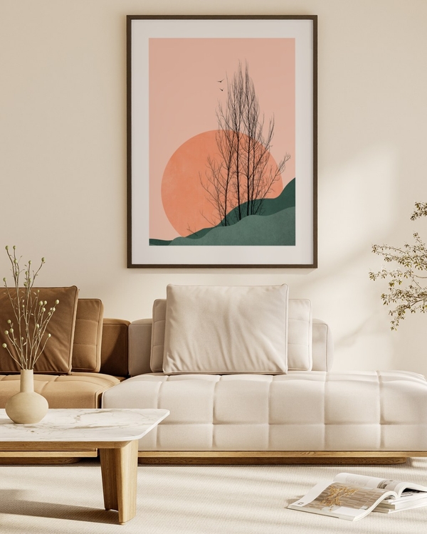 Peach Sun Grove poster in a dark slim frame above a cream sofa in a warm neutral living room
