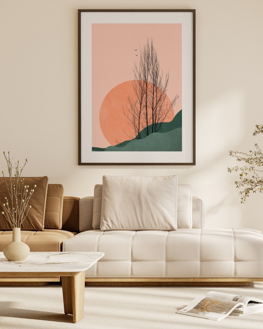 Peach Sun Grove poster in a dark slim frame above a cream sofa in a warm neutral living room