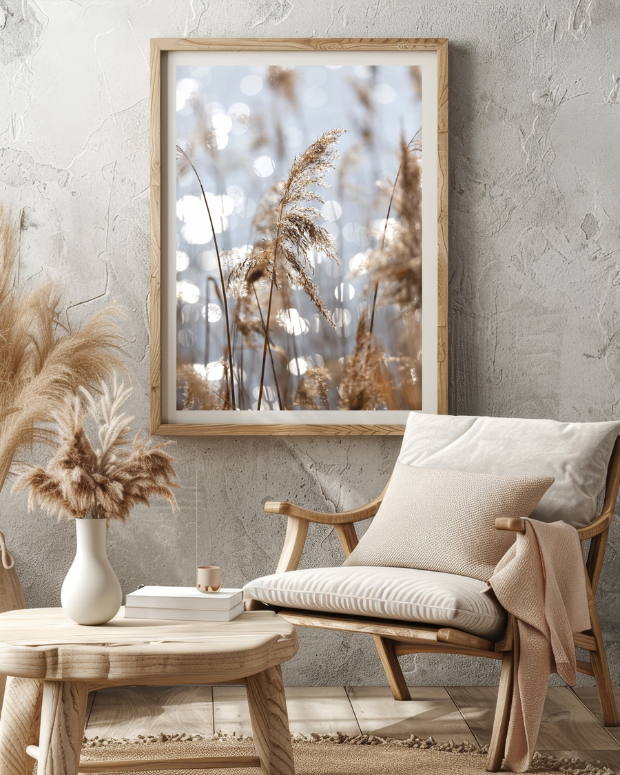 A poster of a Golden reeds with sparkling water in background.