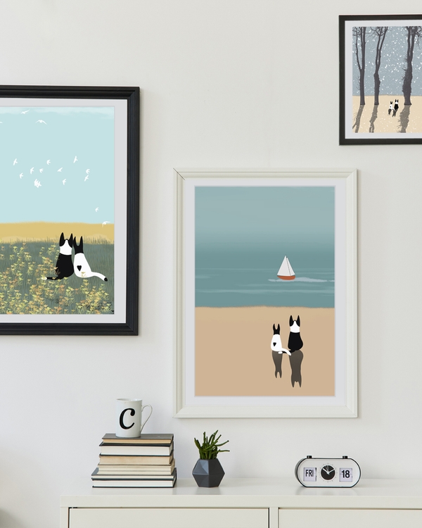 A poster of a Illustrated cats standing by sea with small boat