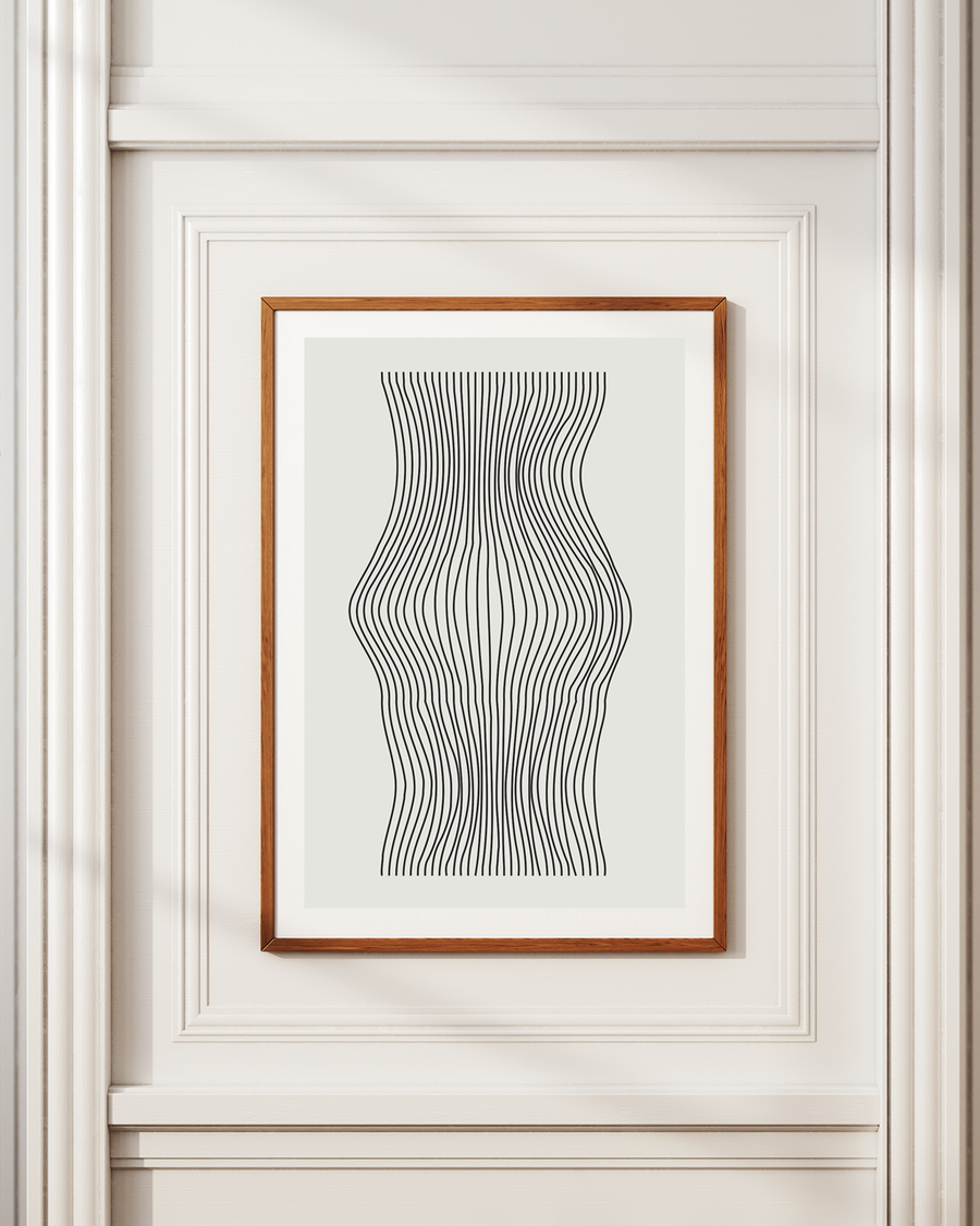 Poster of black lines in a brown frame hanged on a white wall