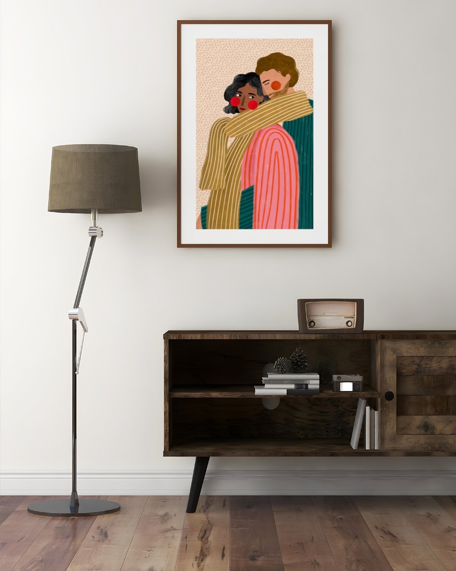 Shared Scarf poster in a dark wood frame above a rustic wooden sideboard in a bright living room