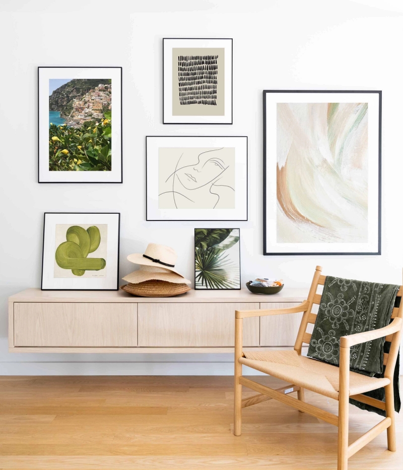 A gallery wall of different posters