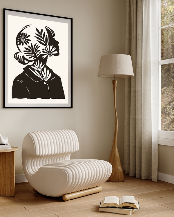 A poster of a silhouette of a woman filled with floral patterns