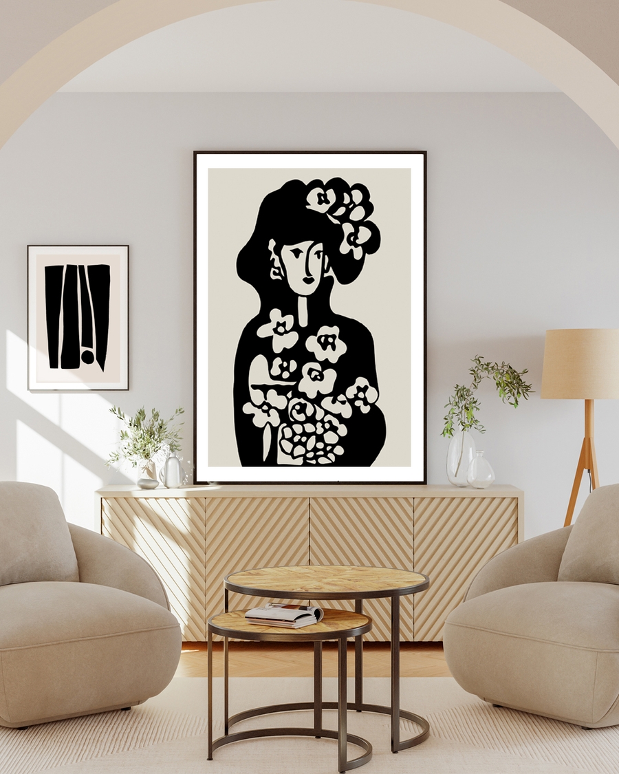 A poster of a black floral silhouette of a woman on beige background
