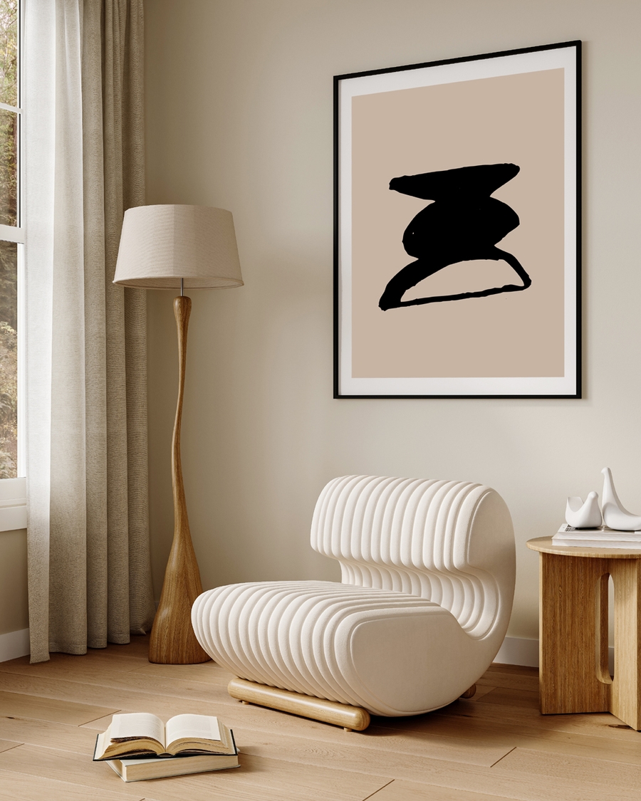 A poster of a abstract black shape on beige minimalist background