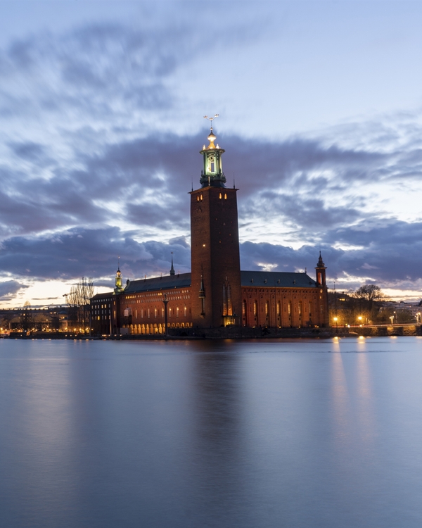 Stockholm City Hall at twilight by waterfront
