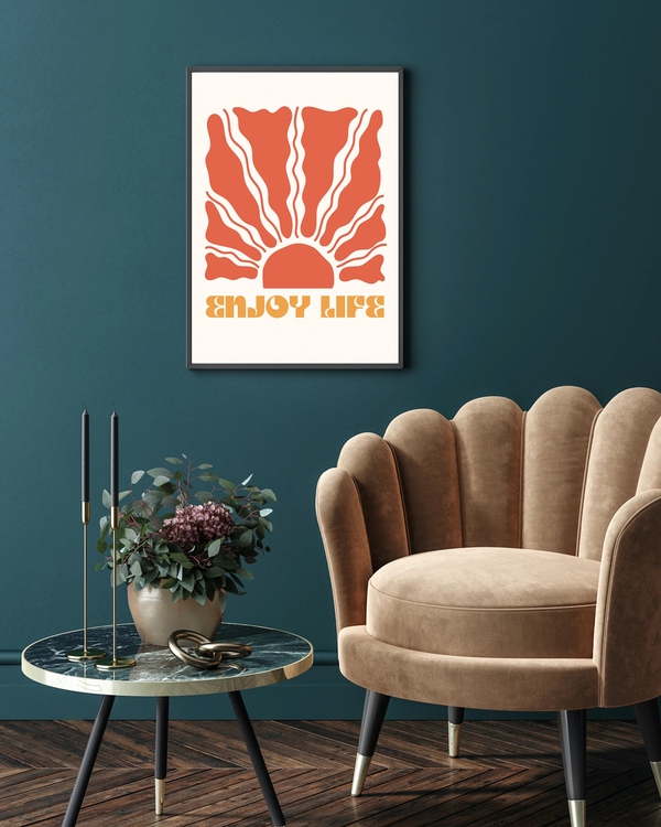 A poster that say enjoy life hanged on a green wall