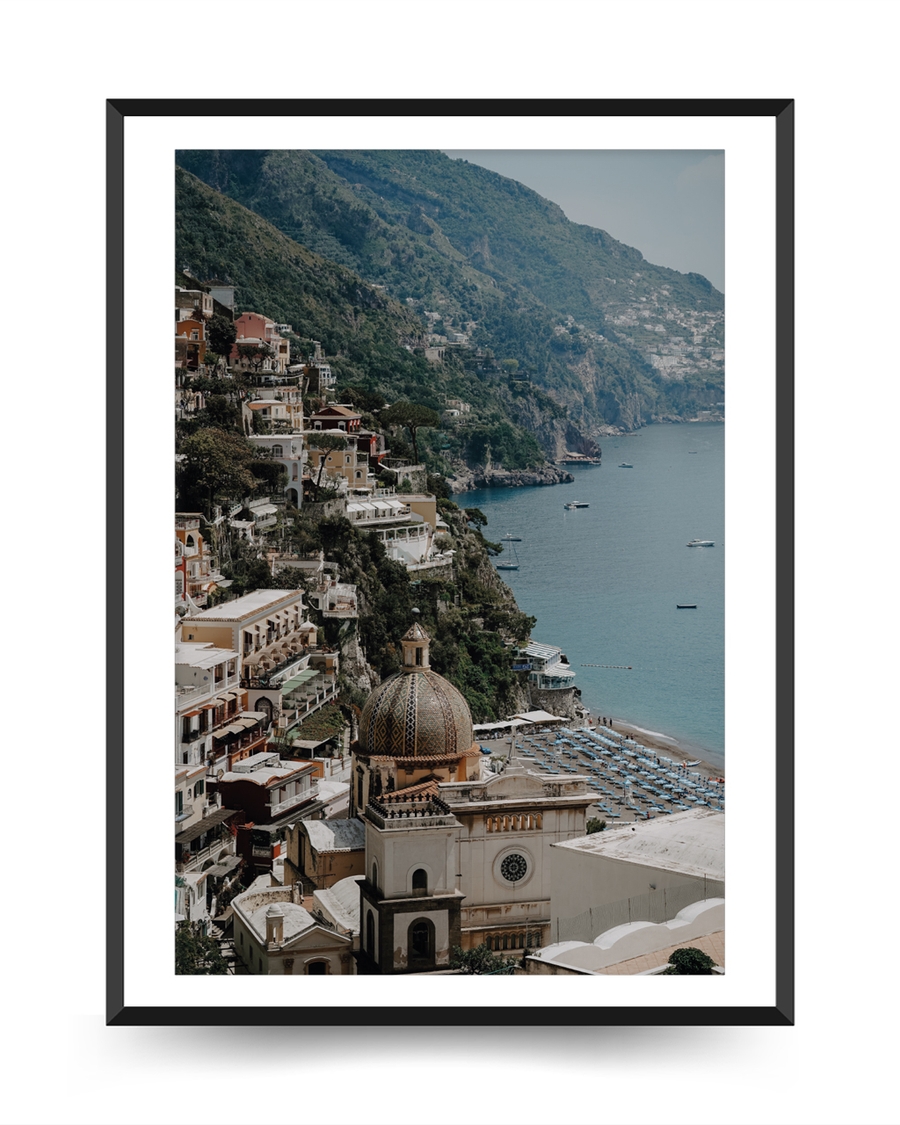 A poster of a Historic coastal city with domed building by sea