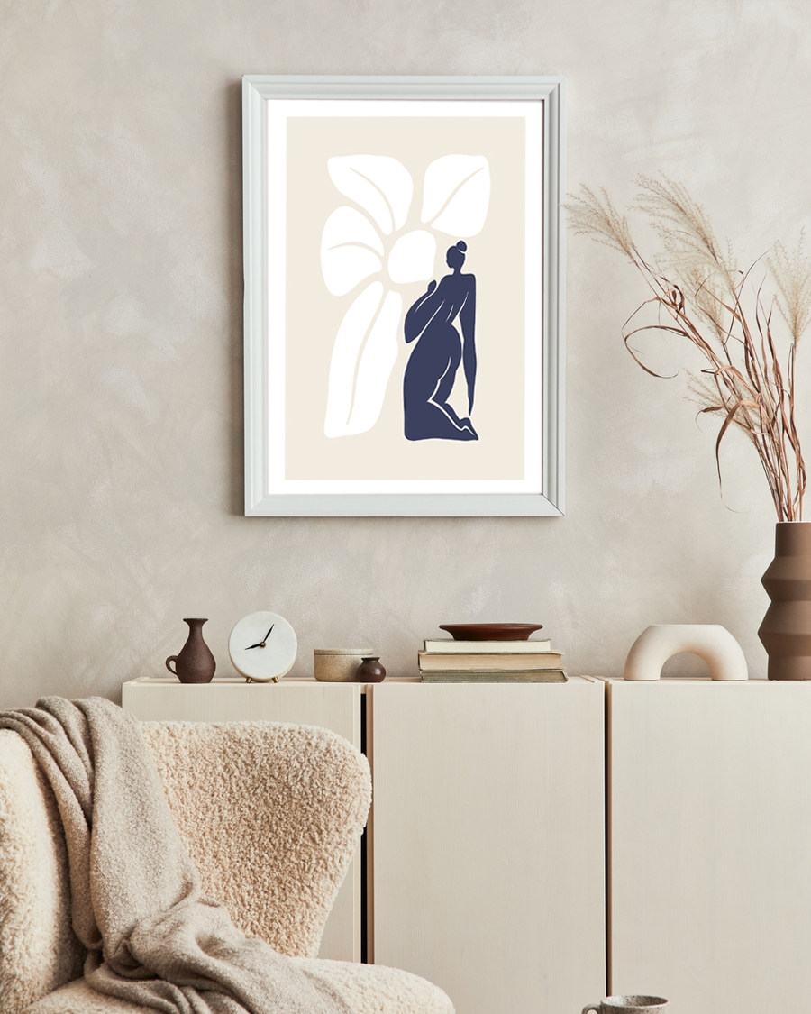 A poster of a navy silhouette beside white petal shapes on beige