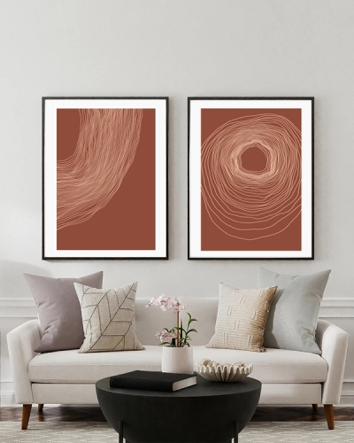 A poster of a three terracotta posters with abstract organic line designs