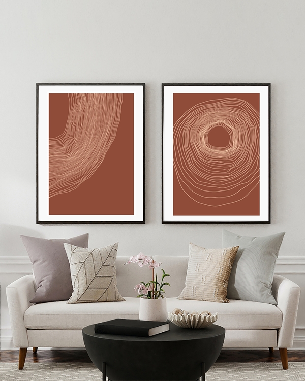 A poster of a three terracotta posters with abstract organic line designs
