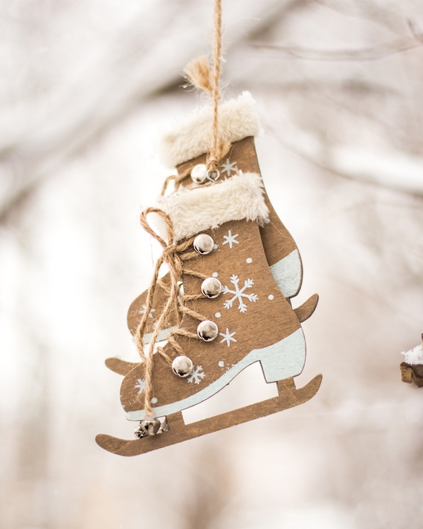 Rustic ice skate ornament with snowflake details