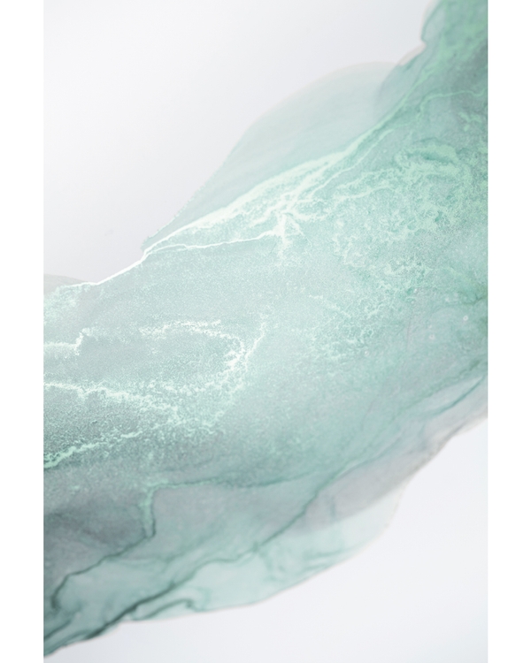 Soft sea green abstract layers flowing on white